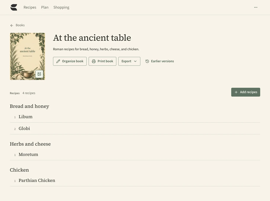 At the ancient table inside Savorum, with an engraved cover, Libum and Globi in the first chapter, and Moretum in the second.